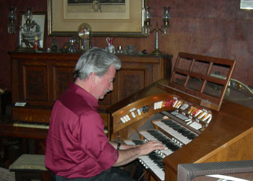 John Fields plays the Rogers organ he donated to the Glendora Historical Society